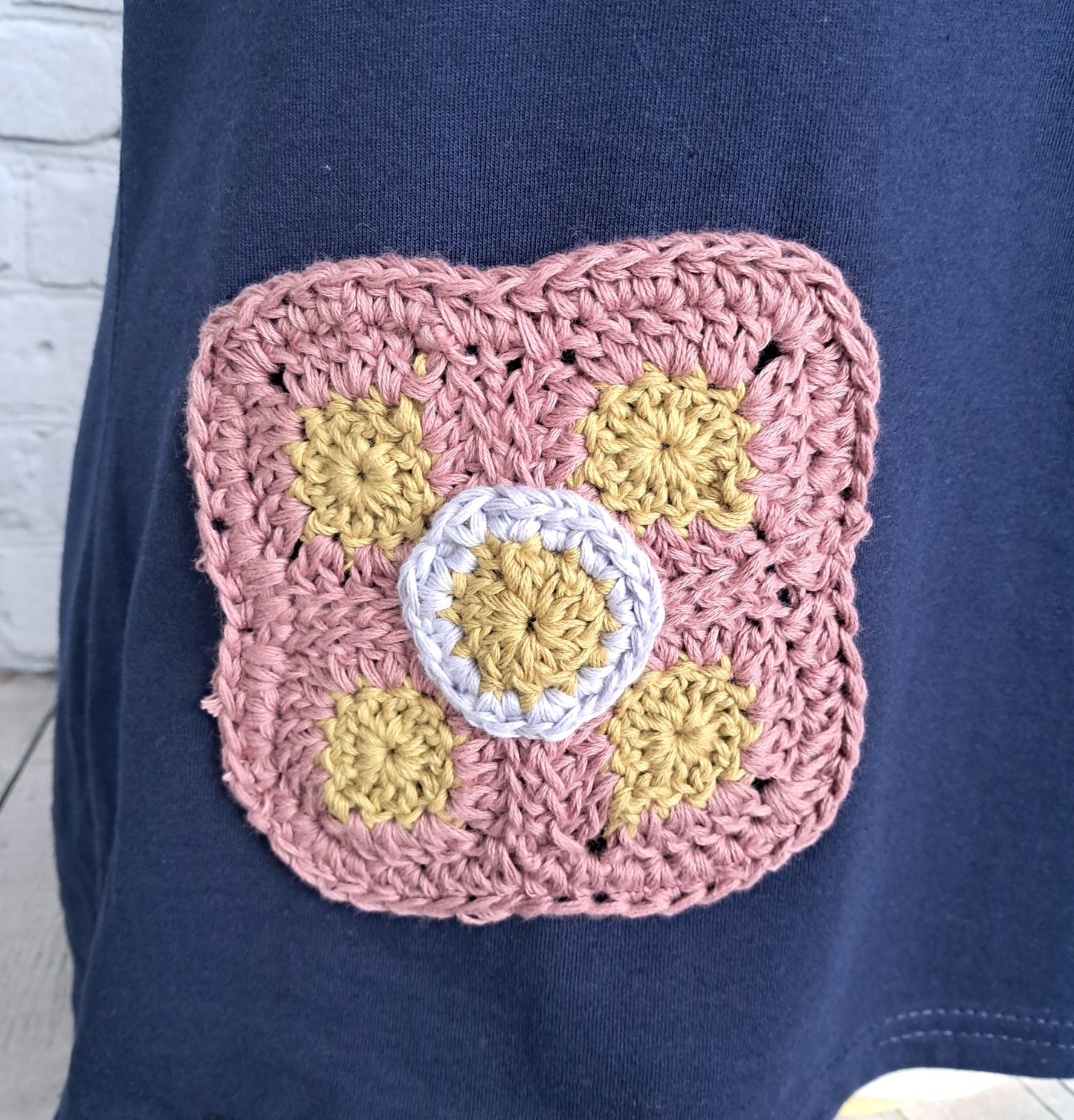 Camiseta de tirantes con bolsillo crochet